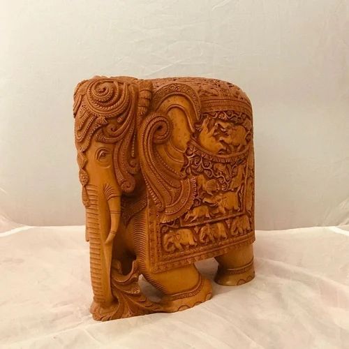 Brown Sandalwood Fine Hand Carved Elephant Statue, For Home Decor, Size/Dimension: 4.7inch