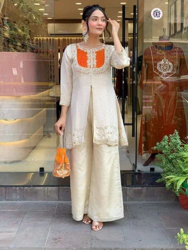 Attractive Occasional Wear Roman Silk With Coding Sequence Embroidered Kurti And Pant