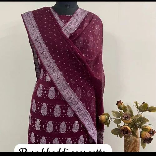 Custom made salwar kameez a deep burgundy color with intricate patterns fabric is lightweight